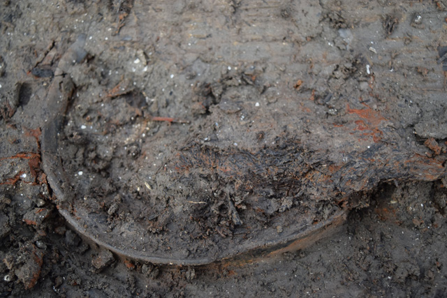 Complete vessel beginning to emerge from the occupation deposit