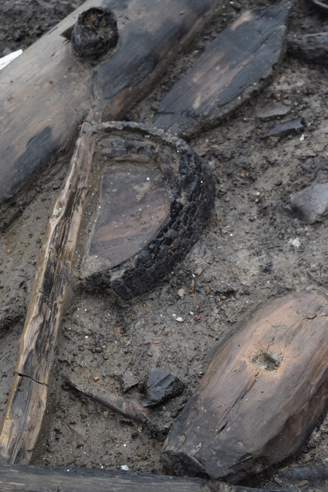 Wooden bucket base in situ within the occupation deposits of roundhouse one.