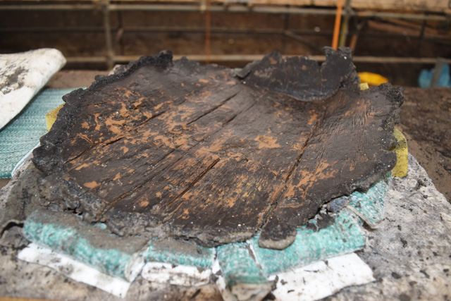 Characteristic wooden platter made from one piece of carved wood, recovered from the wood mass deposit.