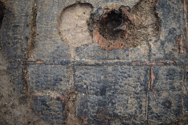 The most complete Bronze Age wheel recovered from a British Bronze Age excavation. The bracer of the wheel is held in place using a dovetail joint. 