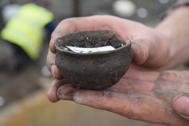 Photo of one of the smallest vessels. Notice the thin walls of the pot and evenness of the shape which were created using a combination of simple coil building and “turning”.