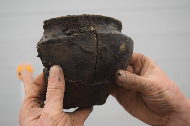 A series of sherds from a fineware bowl. If you look closely at the image you can just make out darker areas, reflecting the small remnants of burnishing that were not eroded by water action. 