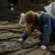 Working shot showing the excavation and cleaning of a wattle panel.